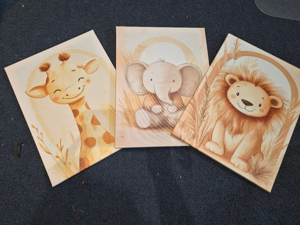 3 canvassen (giraf, leeuw en olifant), Ophalen of Verzenden, Zo goed als nieuw, Wanddecoratie
