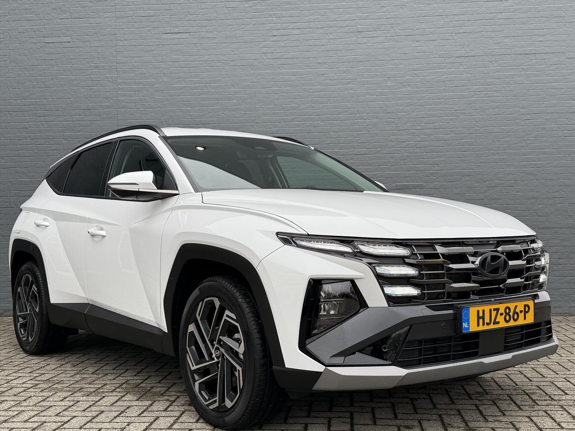 Hyundai Tucson New 1.6 T-GDi PHEV 252pk 2WD Aut Comfort Smar, Auto's, 4 cilinders, Wit, Bedrijf, Hybride Elektrisch/Benzine