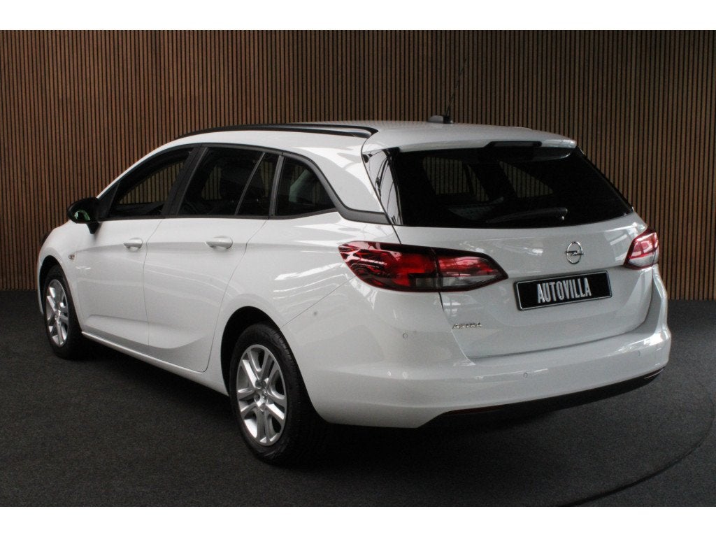Opel Astra Sports Tourer 1.2T Navi Stoel- & stuurverw. Airco, Voorwielaandrijving, Dealer onderhouden, Zwart, 1199 cc