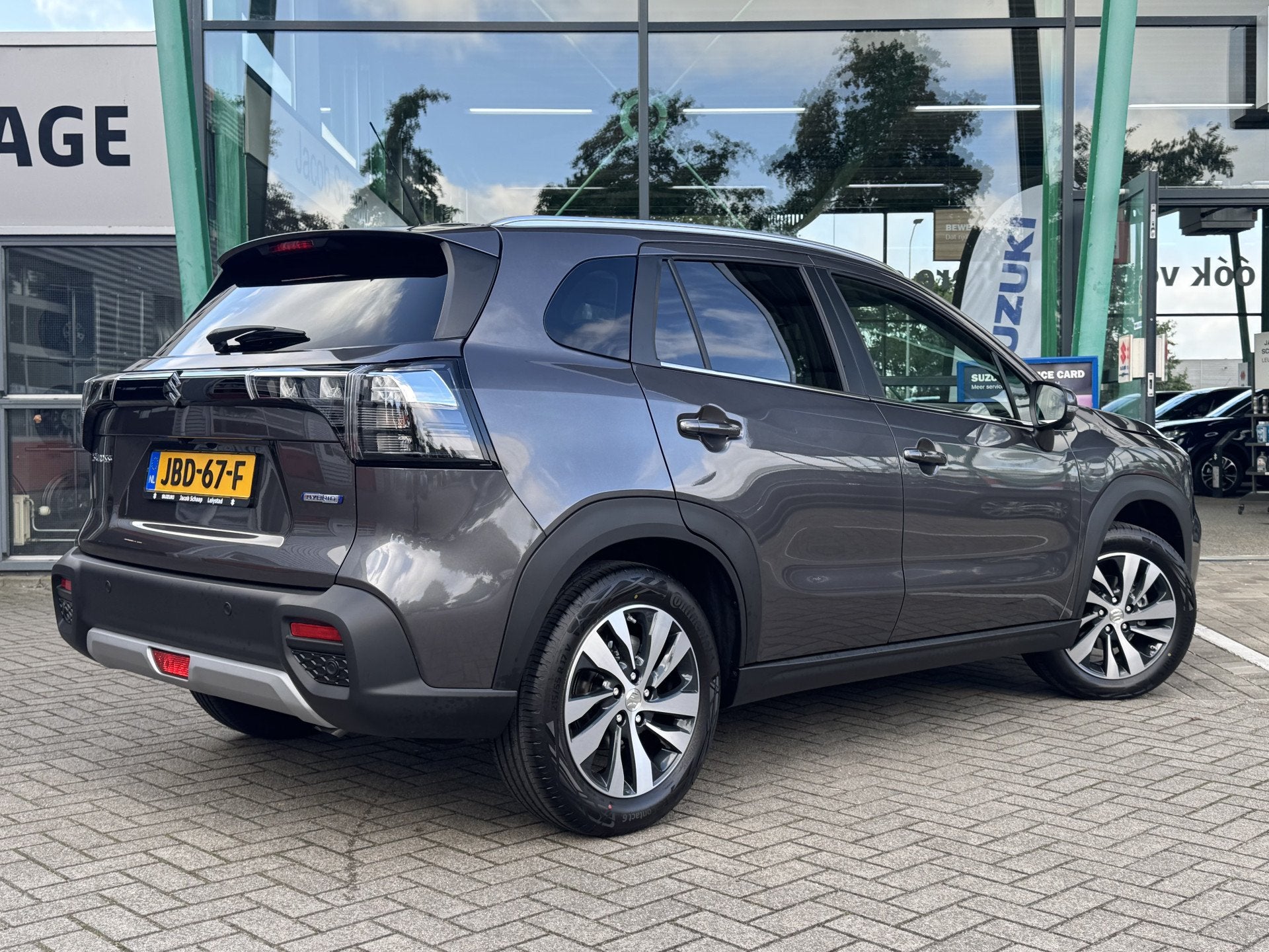 Suzuki S-Cross 1.4 Boosterjet Style Smart Hybrid 111pk | Pan, Auto's, Gebruikt, Zwart, 4 cilinders, Leder en Stof