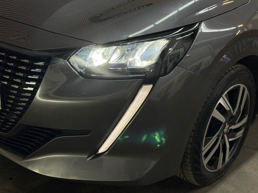 Peugeot 208 1.2 PureTech Allure Pack 2021 LED CAMERA CRUISE, Auto's, Peugeot, 101 pk, Gebruikt, Leder en Stof, 23 km/l