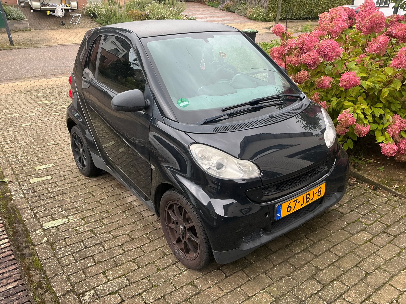 Smart ForTwo 1.0 45KW Coupe MHD AUT 2009 Zwart, Auto's, Automaat, 18 €/maand, 61 pk, Origineel Nederlands