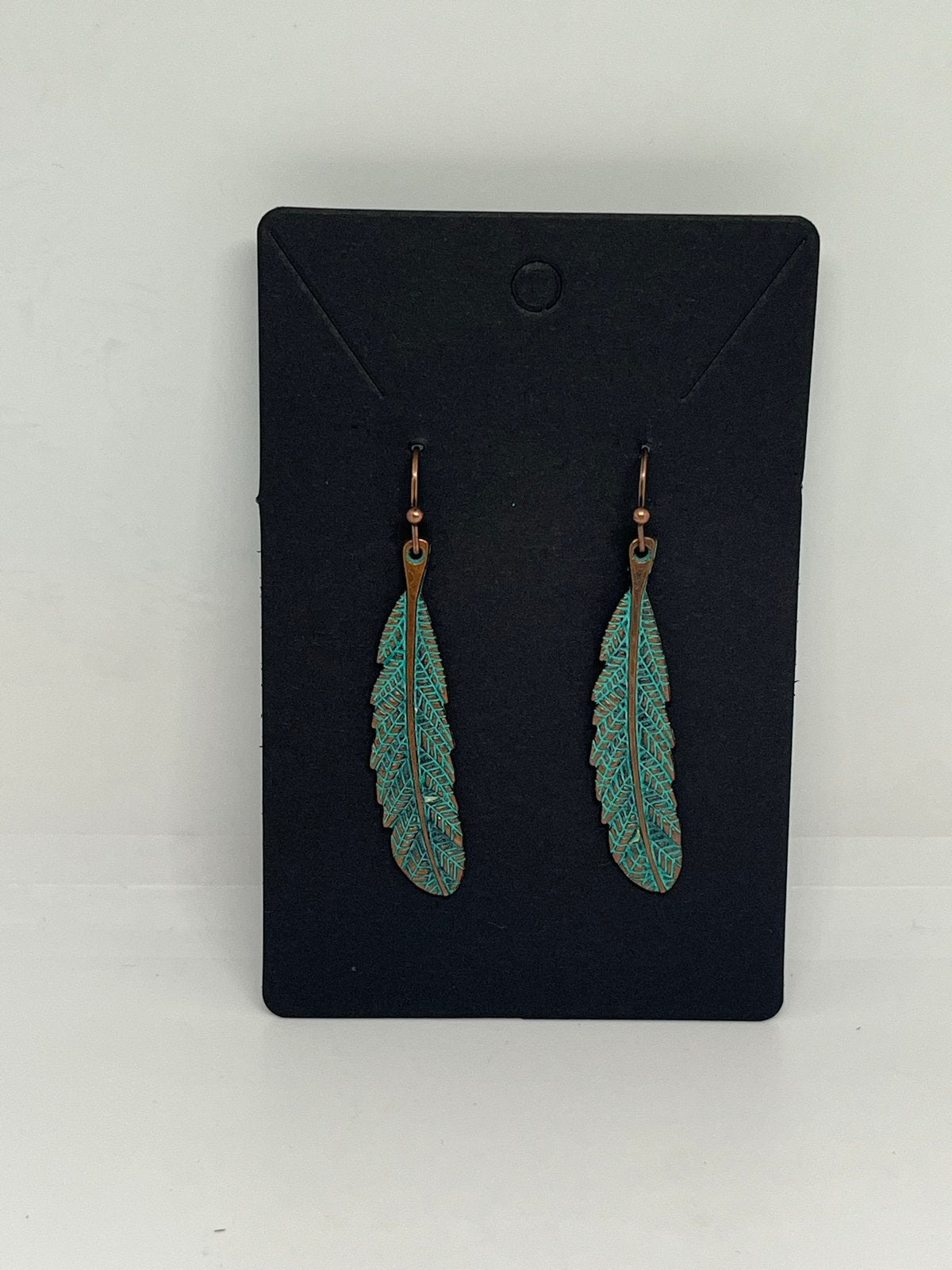Oorbellen met veren in turquoise en koper, Overige materialen, Hangers, Nieuw, Ophalen of Verzenden