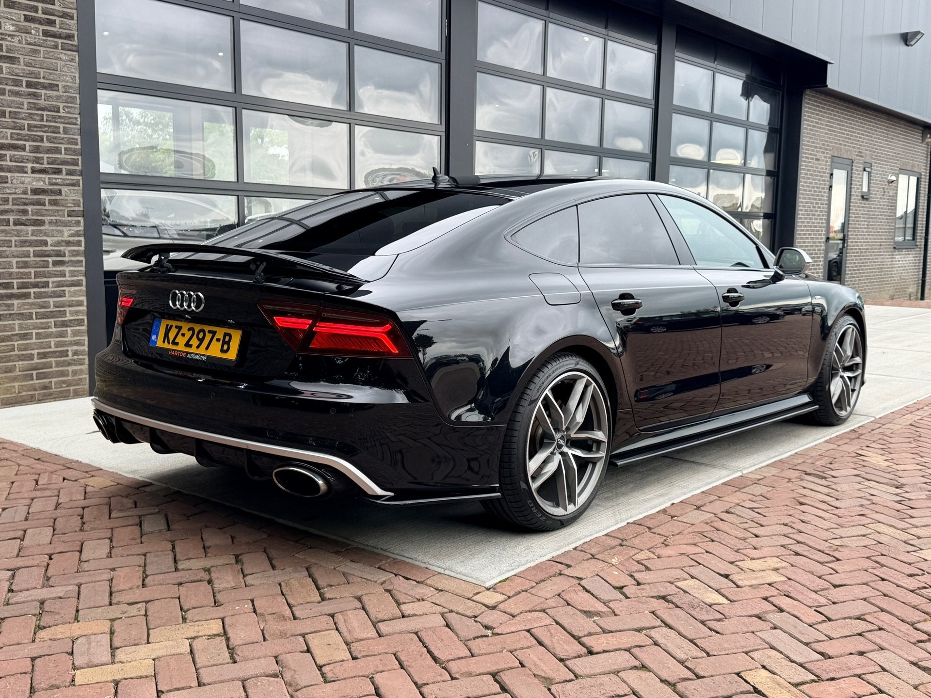 Audi A7 Sportback 1.8 TFSI Pro Line S | Leer | Navi | Clima, Gebruikt, 4 stoelen, Zwart, Bedrijf