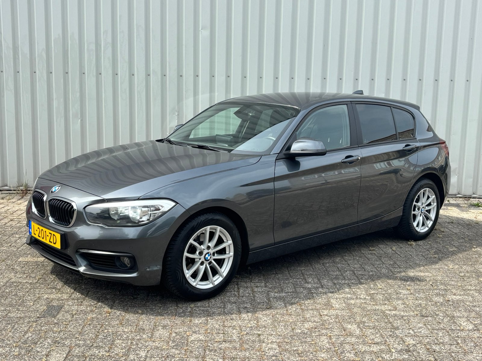 BMW 1-Serie 2.0 118D 150pk 5DRS 2016 AUT 2016 Grijs, Auto's, BMW, Achterwielaandrijving, 1995 cc, 150 pk, Lichtsensor