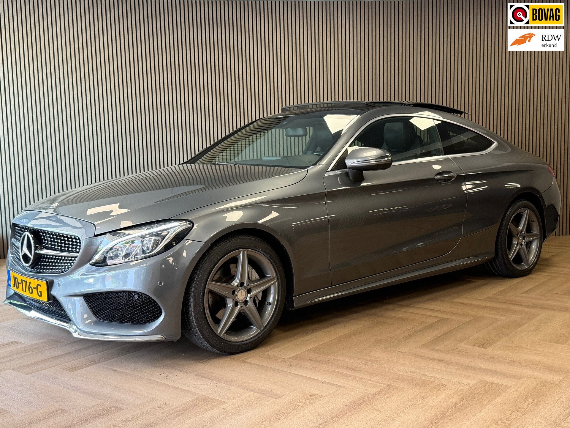 Mercedes-Benz C-klasse Coupé C180 Ambition AUT AMG PANORAMA, Automaat, Achterwielaandrijving, Met garantie (alle), 4 stoelen