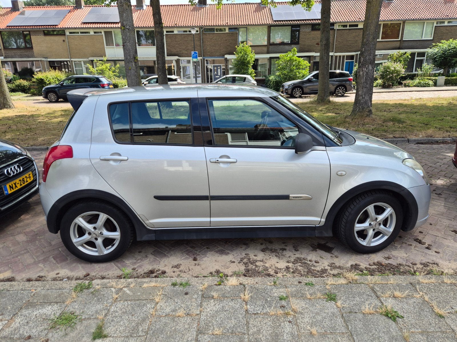 Suzuki Swift exclusive 1.5 5D 2007 keyless Grijs 188.847 km, Auto's, Suzuki, Voorwielaandrijving, 15 km/l, 40 €/maand, 4 cilinders