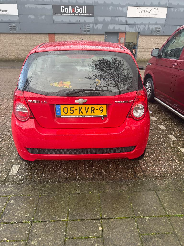 Chevrolet Aveo 1.2 16V 3D 2010 Rood, Auto's, Chevrolet, Particulier, Aveo, ABS, Airbags, Airconditioning, Alarm, Android Auto