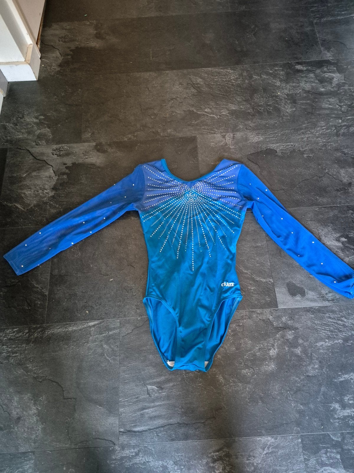 Turnpakje Craze blauw 140/146, Sport en Fitness, Turnen, Ophalen of Verzenden, Zo goed als nieuw, Blauw, Overige typen