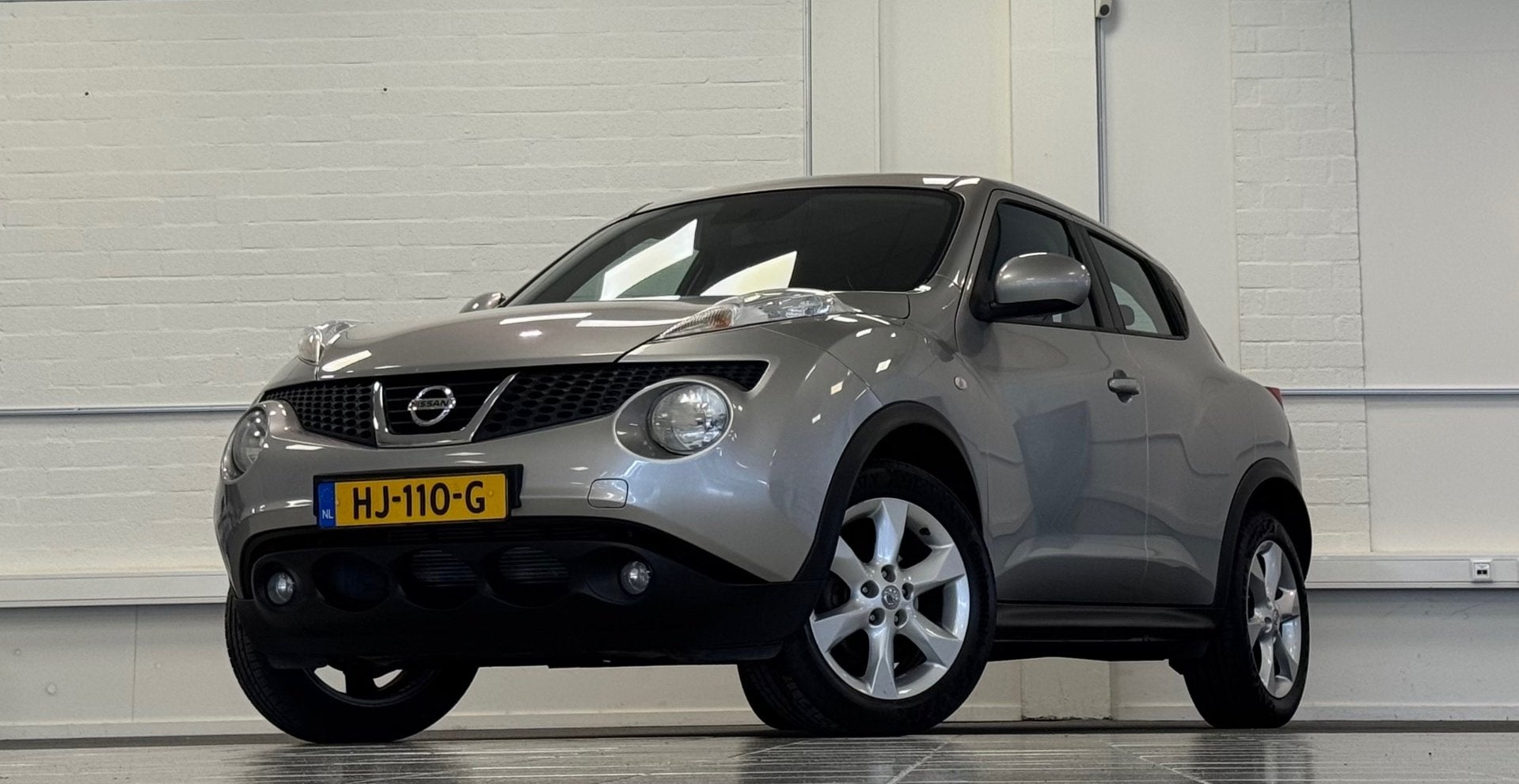 Nissan Juke 1.6i 16V Acenta Clima Navigatie Mooi!, Voorwielaandrijving, Euro 5, Stof, Zwart