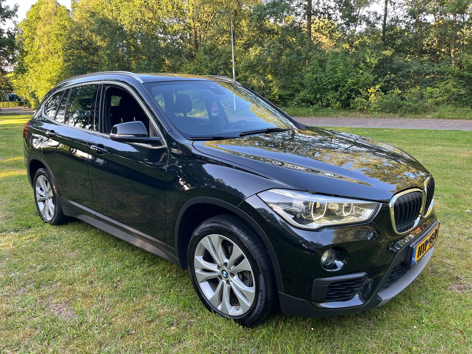 BMW X1 Sdrive18i Advantage Xenon Zwart, Auto's, BMW, Zwart, Particulier, 1405 kg, Geïmporteerd