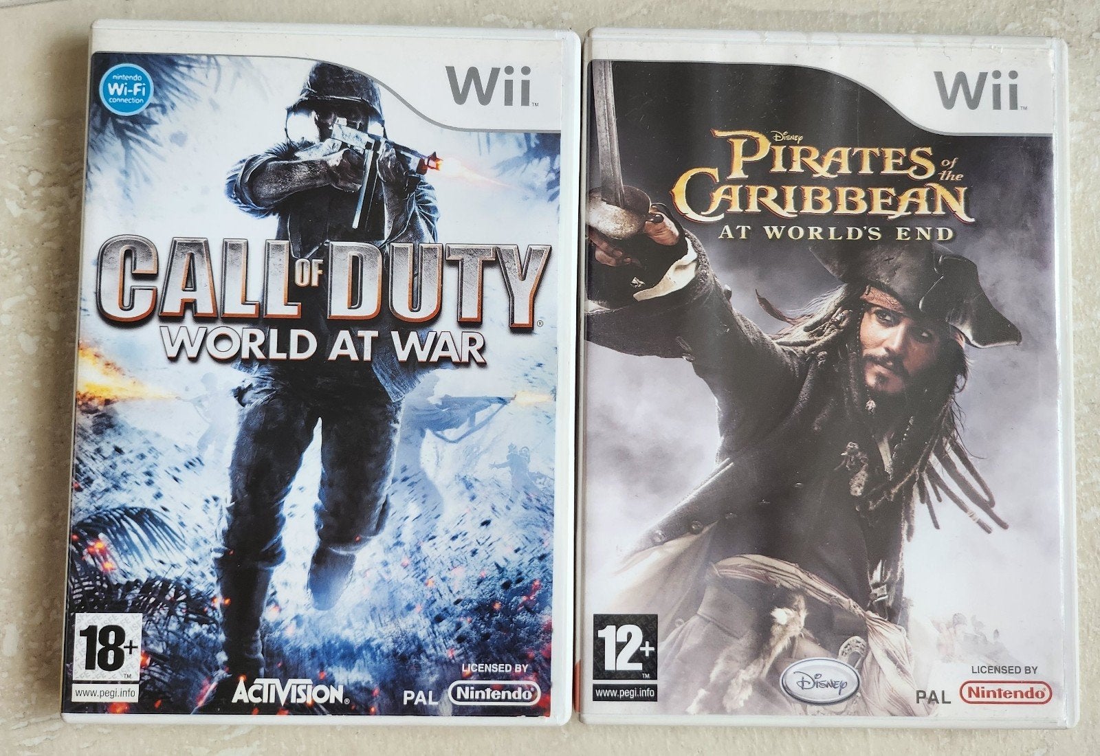 Wii Games: Call of Duty World at War & Pirates of Caribbean, Spelcomputers en Games, Vanaf 18 jaar, Zo goed als nieuw, 3 spelers of meer