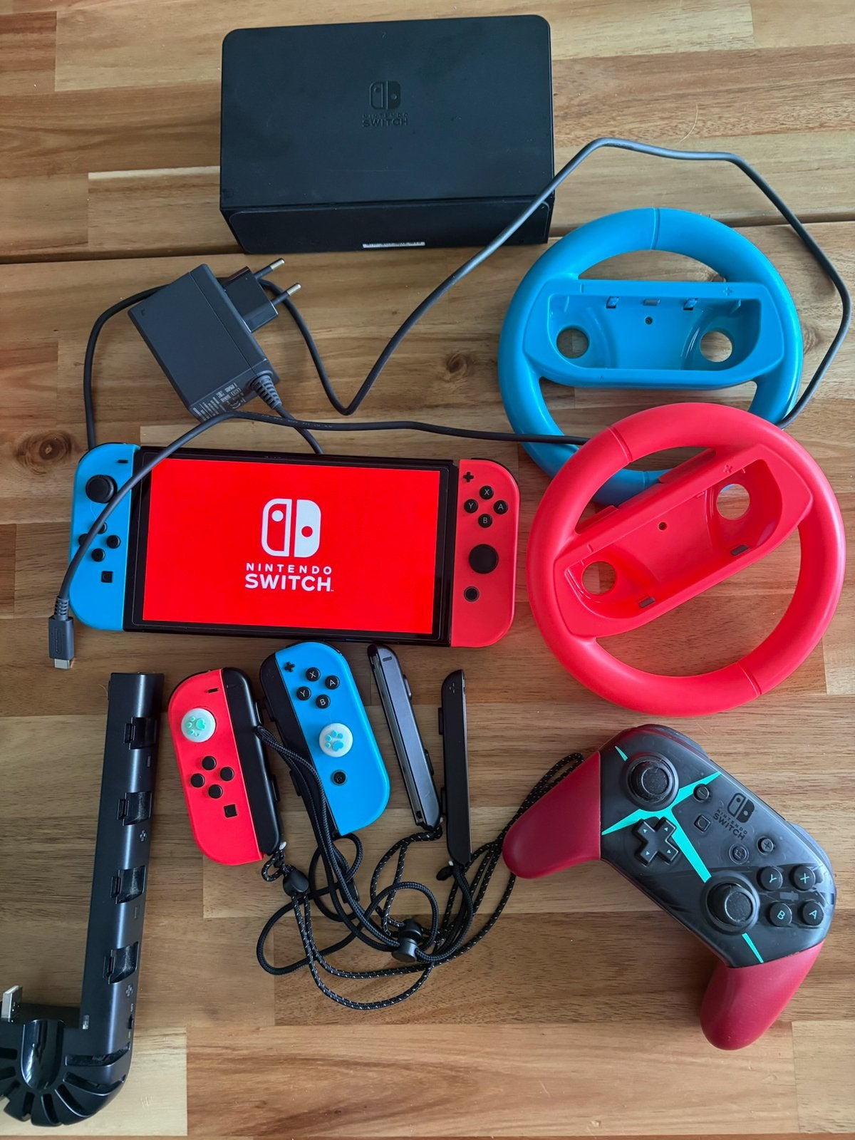 Nintendo Switch OLED met 4 controllers en 5 games, Spelcomputers en Games, Switch OLED, Met games, Ophalen of Verzenden, Zo goed als nieuw