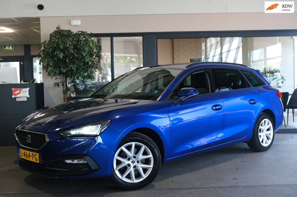 Seat Leon Sportstourer 1.5 TSI Style Business Intense Navi A, Auto's, Seat, Voorwielaandrijving, Stof, 4 cilinders, Origineel Nederlands