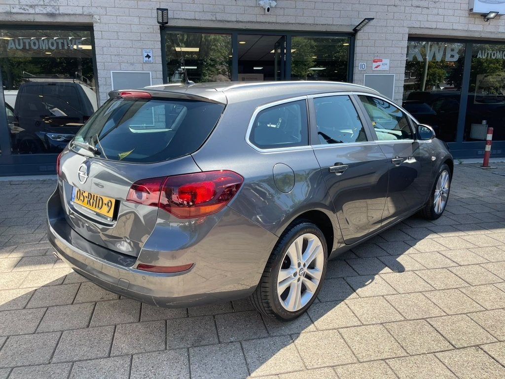 Opel Astra Sports Tourer 1.4 Turbo Sport Nieuwe apk NAP, Auto's, Euro 5, Gebruikt, 4 cilinders, 1337 kg