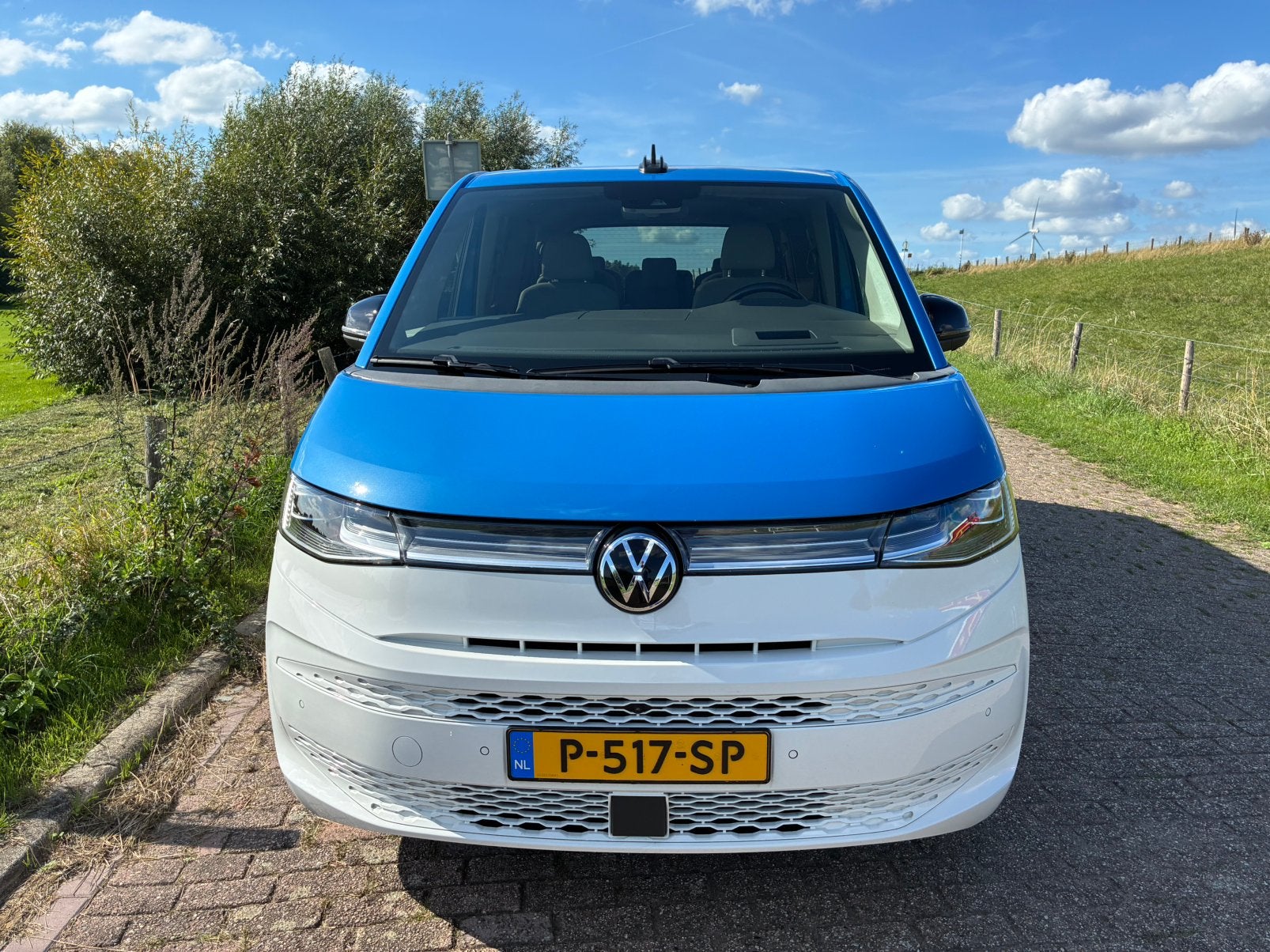 Volkswagen Multivan 1.4 Ehybrid 218pk L1h1 6-DSG 2021 Blauw, Auto's, Dealer onderhouden, Beige, Overige carrosserieën, 2077 kg