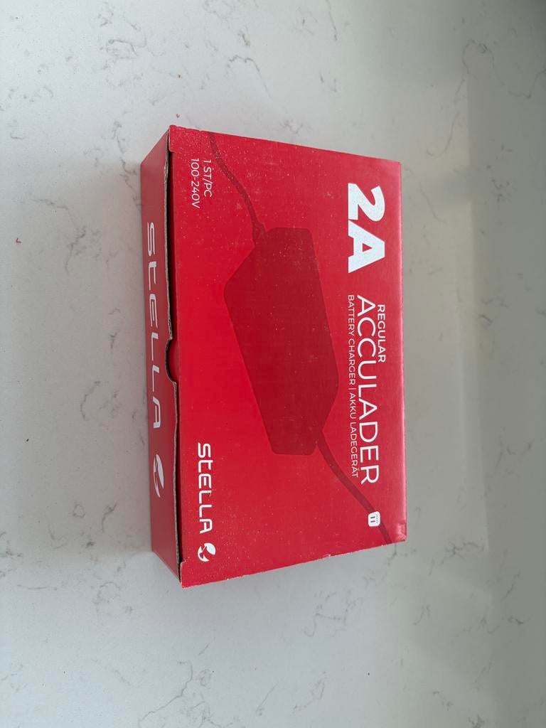 Stella 2A Acculader – Nieuw in doos, Fietsen en Brommers, Elektrische fietsen, Ophalen, Nieuw, Overige merken