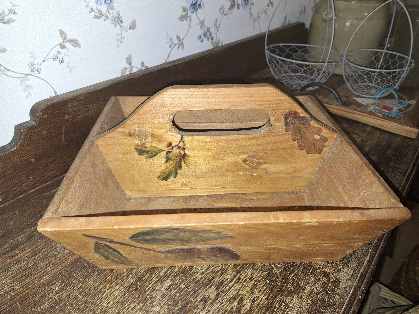 kleine houten plukmand, Ophalen