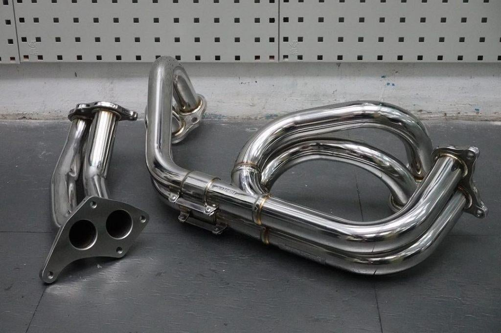 Tomei Expreme spruitstuk header - Impreza WRX & STi 02-14