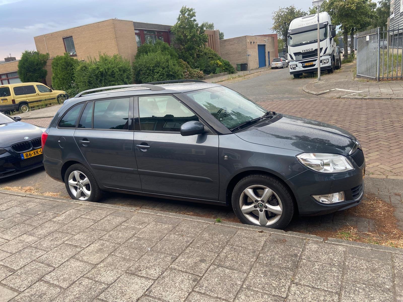 Skoda Fabia 1.2 TSI 77KW Combi 2010 Grijs, Auto's, Skoda, Voorwielaandrijving, Euro 5, 40 €/maand, Zwart
