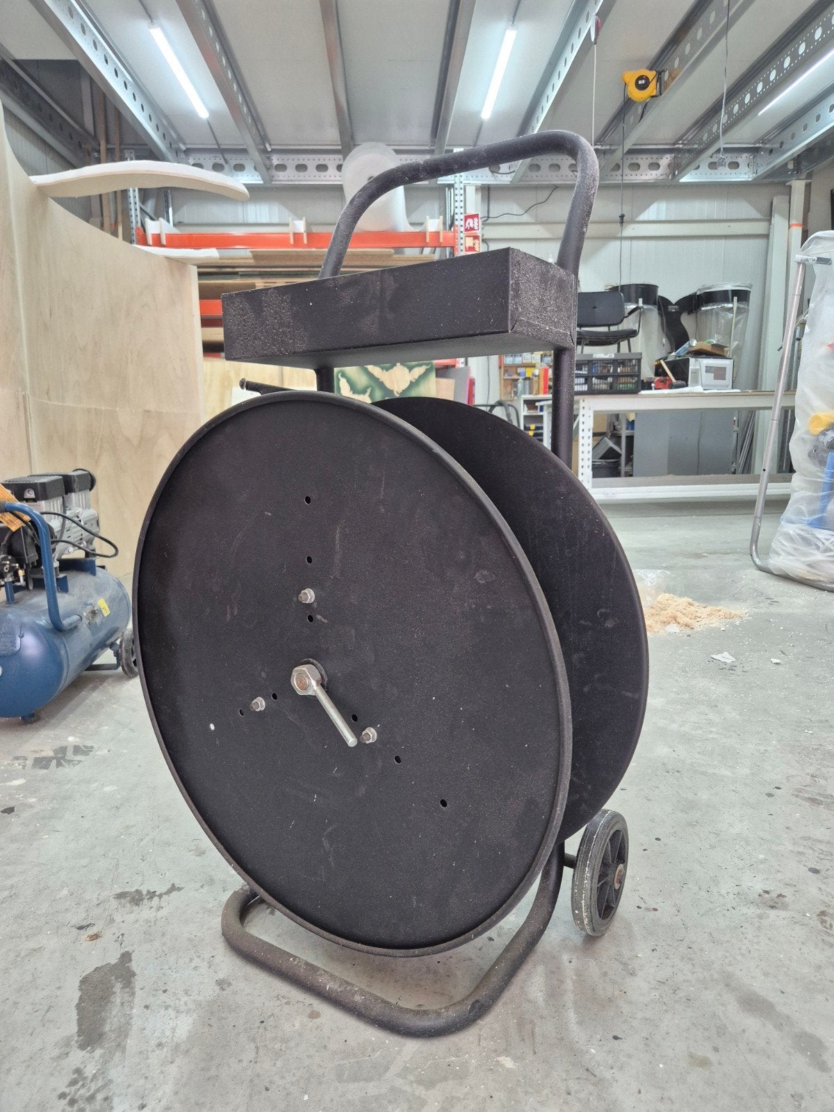 Haspel met binddraad voor het verpakken van pallets, Ophalen