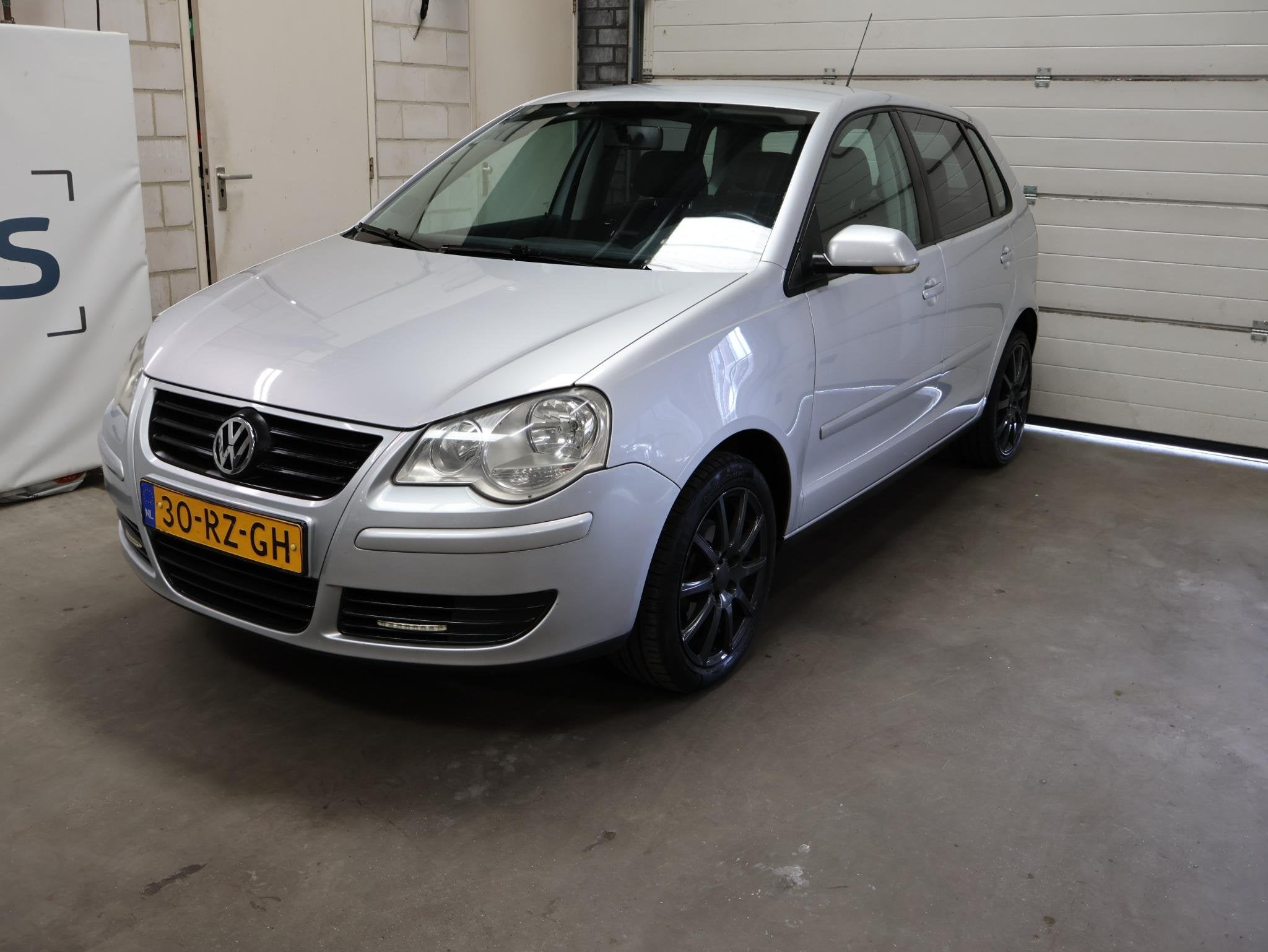 Volkswagen Polo 1.2-12V Optive NAP Airco 07-27 APK, Voorwielaandrijving, Stof, Zwart, 540 kg