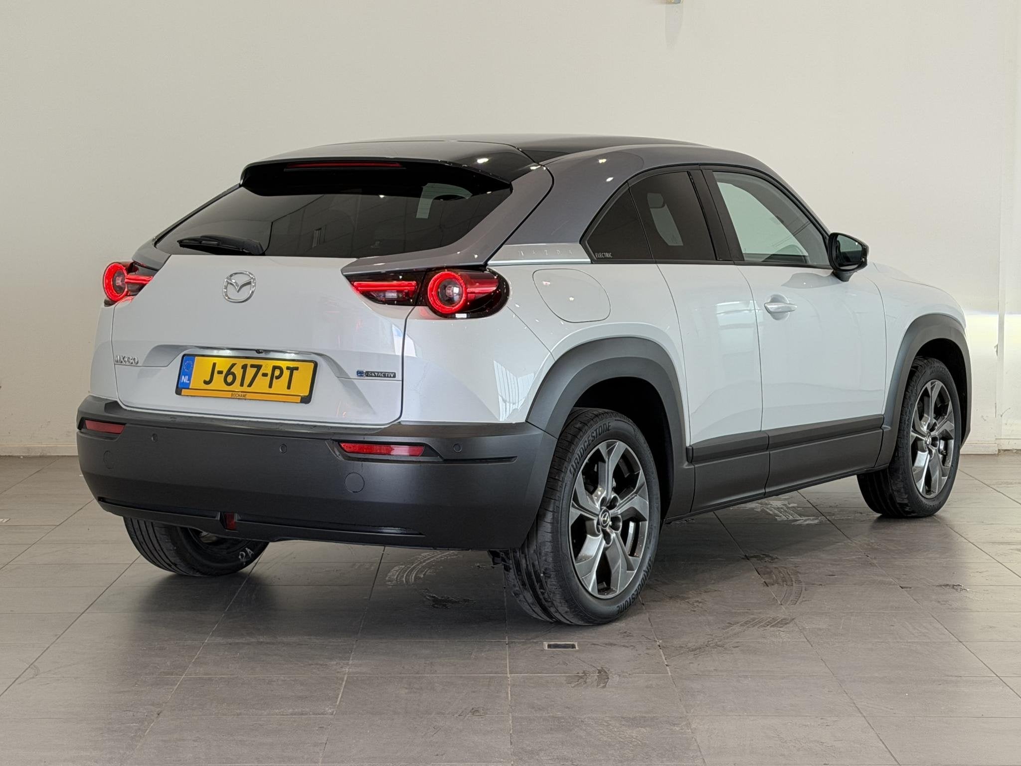 Mazda MX-30 e-SkyActiv 145 First Edition 36 kWh | 92,7% SOH, Auto's, Mazda, 145 pk, Stof, Gebruikt, Met garantie (alle)