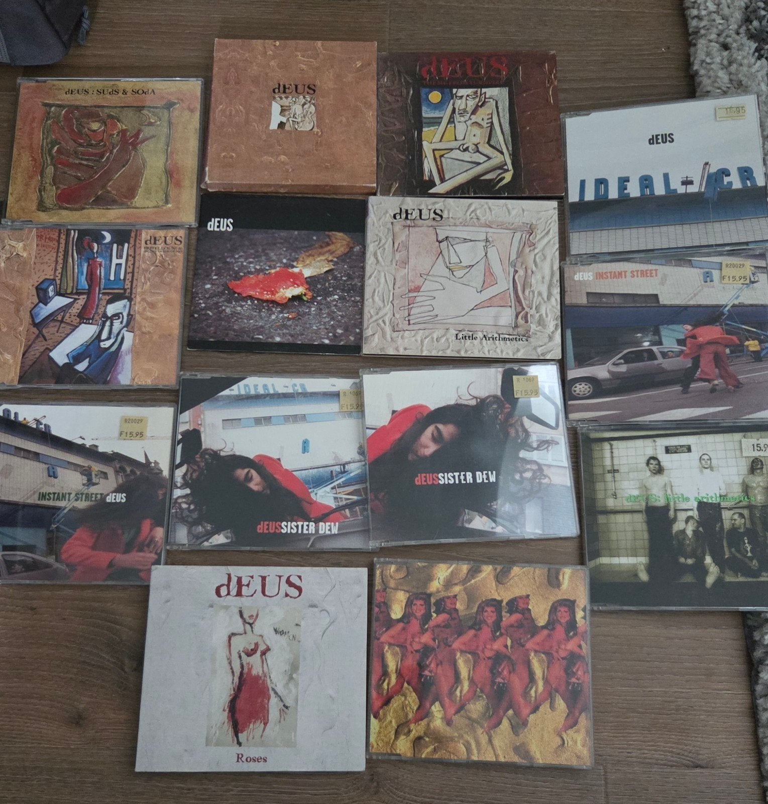Deus CD collectie - Diverse singles, 14 stuks, Ophalen of Verzenden, Gebruikt, Album, Inclusief doosje