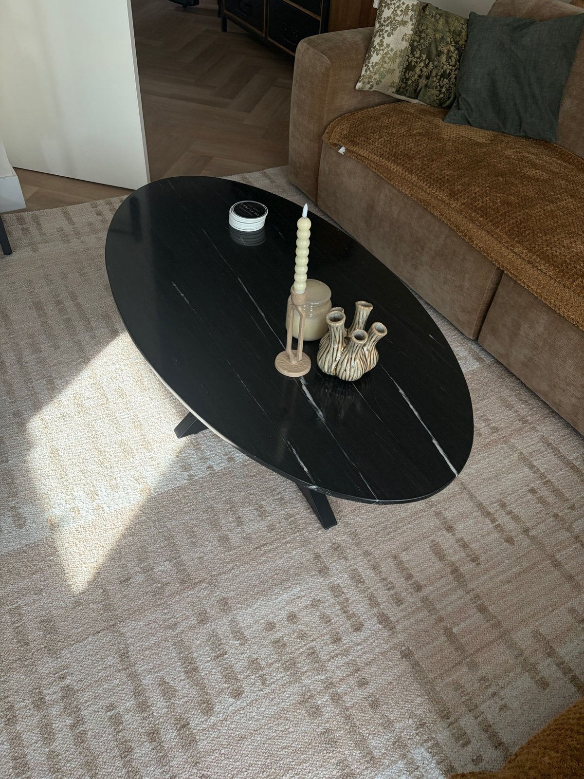 Ovale marmeren salontafel 130x70 cm - Zwart met lichte struc, Ophalen, Overige materialen, Gebruikt, 100 tot 150 cm