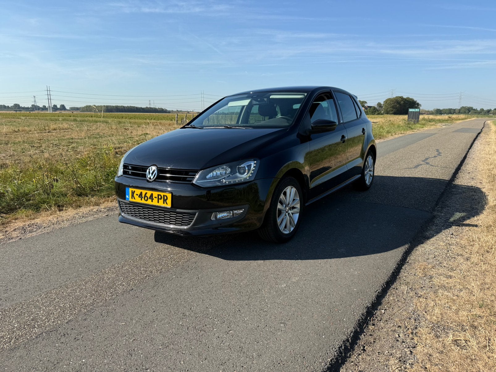 Volkswagen Polo 1.2 TSI Style 77KW 2012 Zwart, Voorwielaandrijving, Stof, 40 €/maand, Zwart