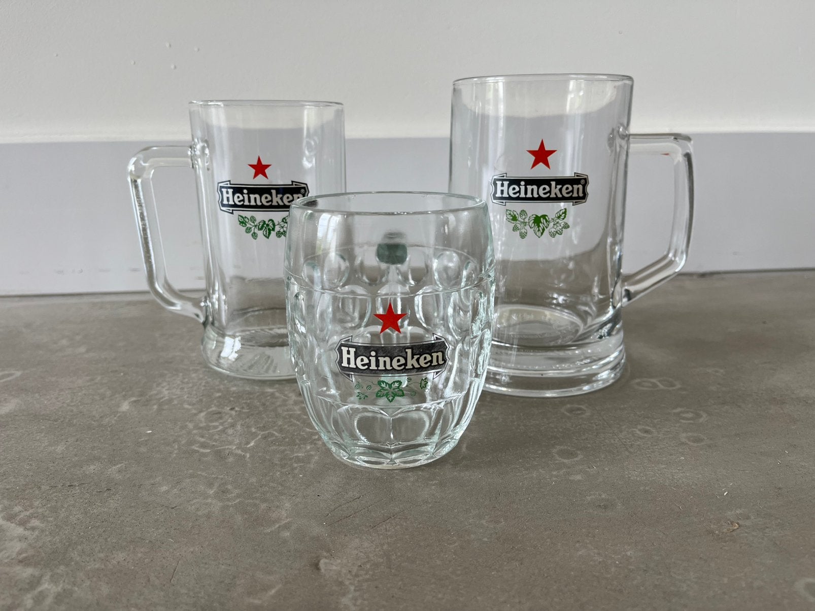Verzameling Heineken glazen en losse items, Verzamelen, Glas en Borrelglaasjes, Ophalen, Zo goed als nieuw, Bierglas