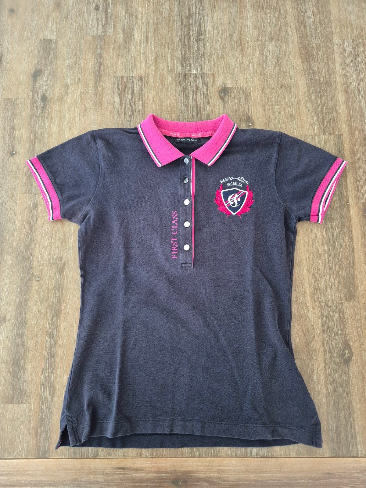 Donkerblauwe Euro-Star polo maat M
Weinig gedragen., Ophalen, Zo goed als nieuw, Dressuur, Bovenkleding