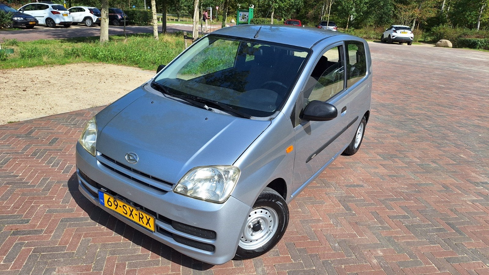 Daihatsu Cuore 1.0 Osaka 3D 2006 Grijs, Auto's, Voorwielaandrijving, Stof, 600 kg, 18 €/maand
