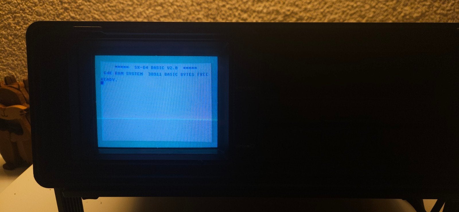 Commodore SX64 met joystick, ca. 75 diskettes en boekjes, Computers en Software, Ophalen of Verzenden, Commodore