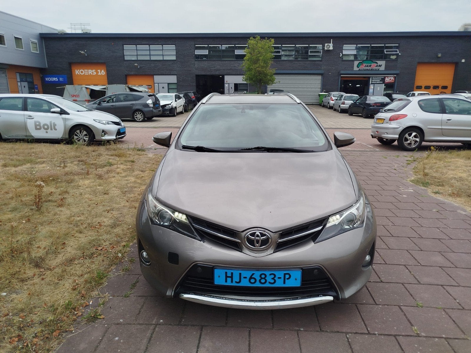 Toyota Auris 1.8 Hybrid Touring Sports CVT 2015 Grijs, Stationwagon, 25 km/l, Te koop, Volledig hybride