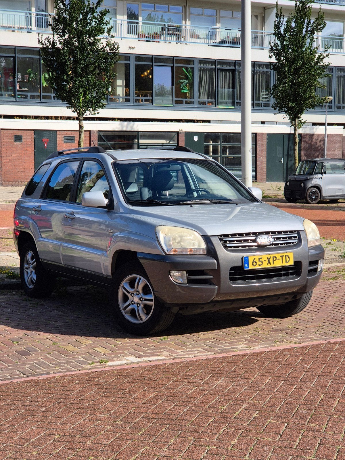Kia Sportage 2.0 2WD 2007 Grijs - Carplay, Cruise, P-Sensor, Auto's, 1442 kg, 4 cilinders, Leder en Stof, Origineel Nederlands