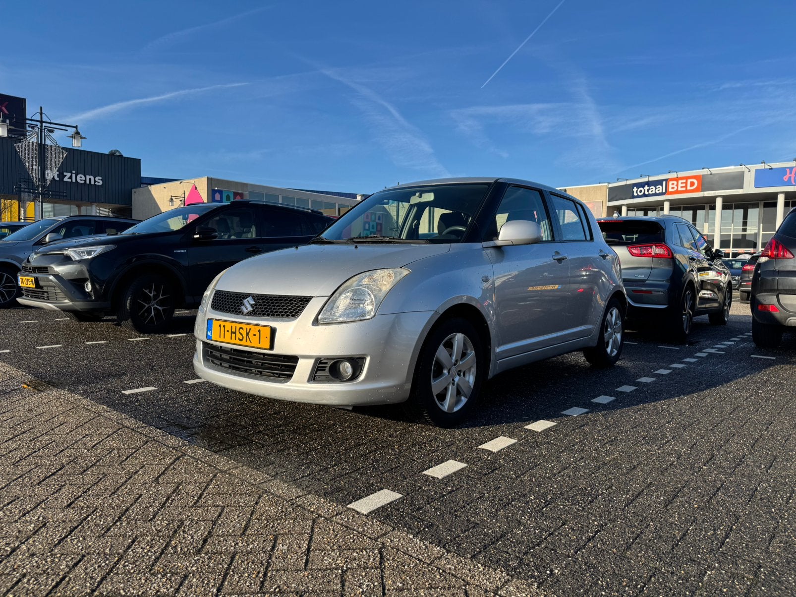 Suzuki Swift 1.3 5DRS 2009 Grijs, Auto's, Voorwielaandrijving, Stof, 40 €/maand, Zwart