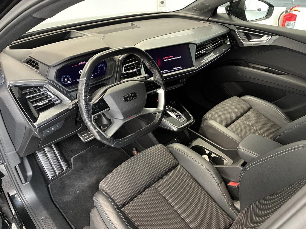 Audi Q4 Sportback e-tron 40 S-Line Competition 77 kWh | SONO, Auto's, Audi, Achterwielaandrijving, Gebruikt, Met garantie (alle)