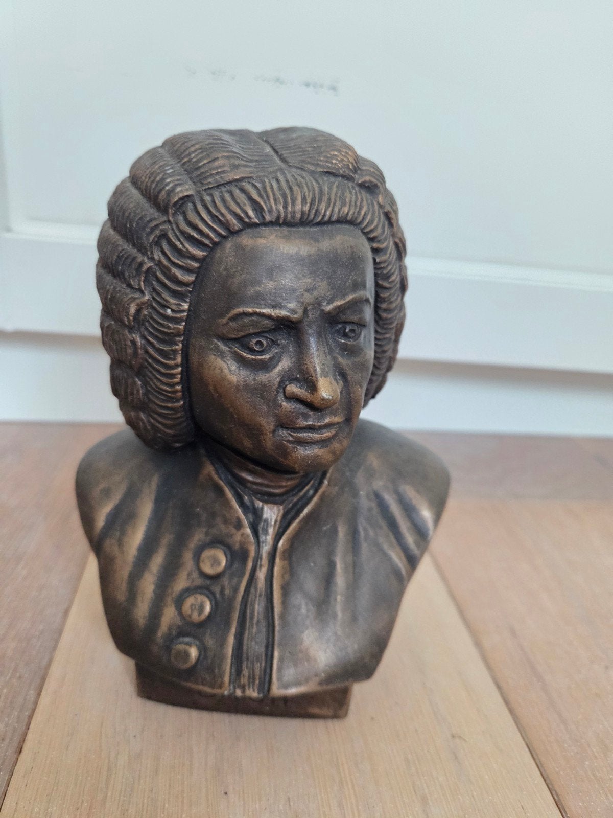 Borstbeeld van Bach, Ophalen