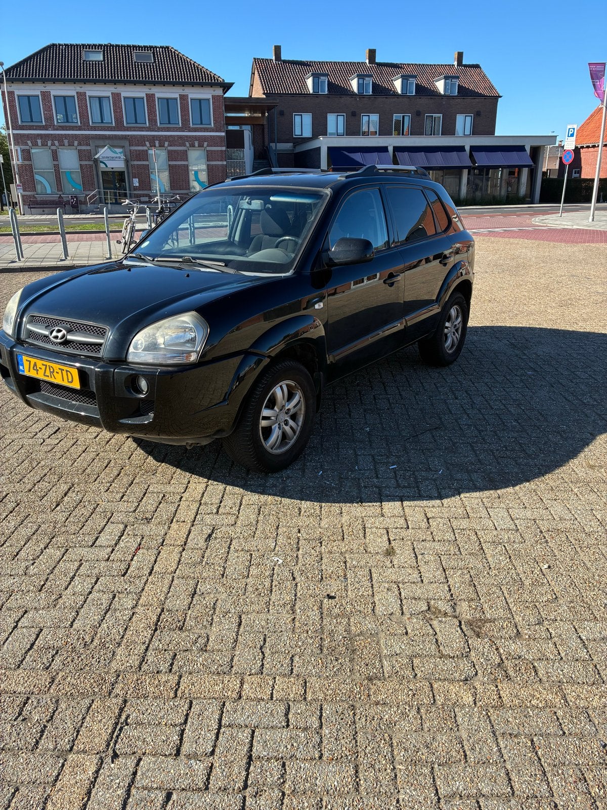 Hyundai Tucson 2008, Auto's, 4 cilinders, Zwart, Origineel Nederlands, 75 €/maand