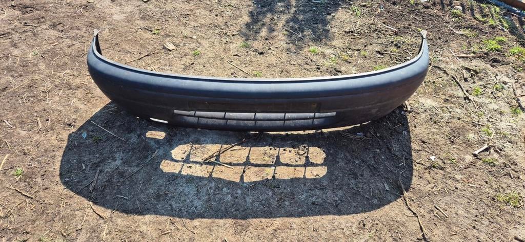Bumper Nissan Micra K11 uit 1994 - Gebruikt, Auto-onderdelen, Ophalen of Verzenden, Voor, Nissan, Bumper