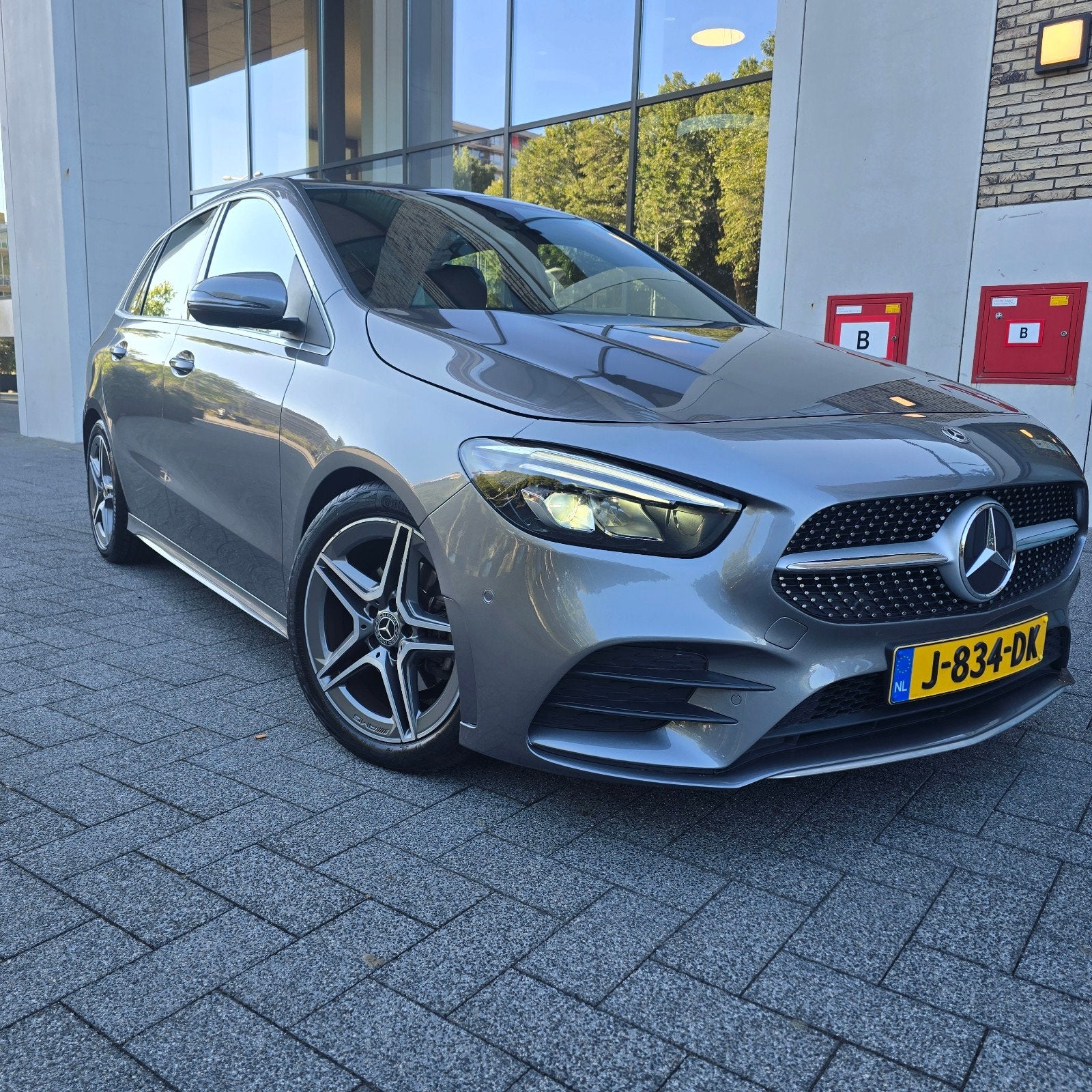 Mercedes-Benz B180 Business Solution AMG | NAP | DealerOnder, Auto's, Euro 5, 136 pk, Zwart, 4 cilinders