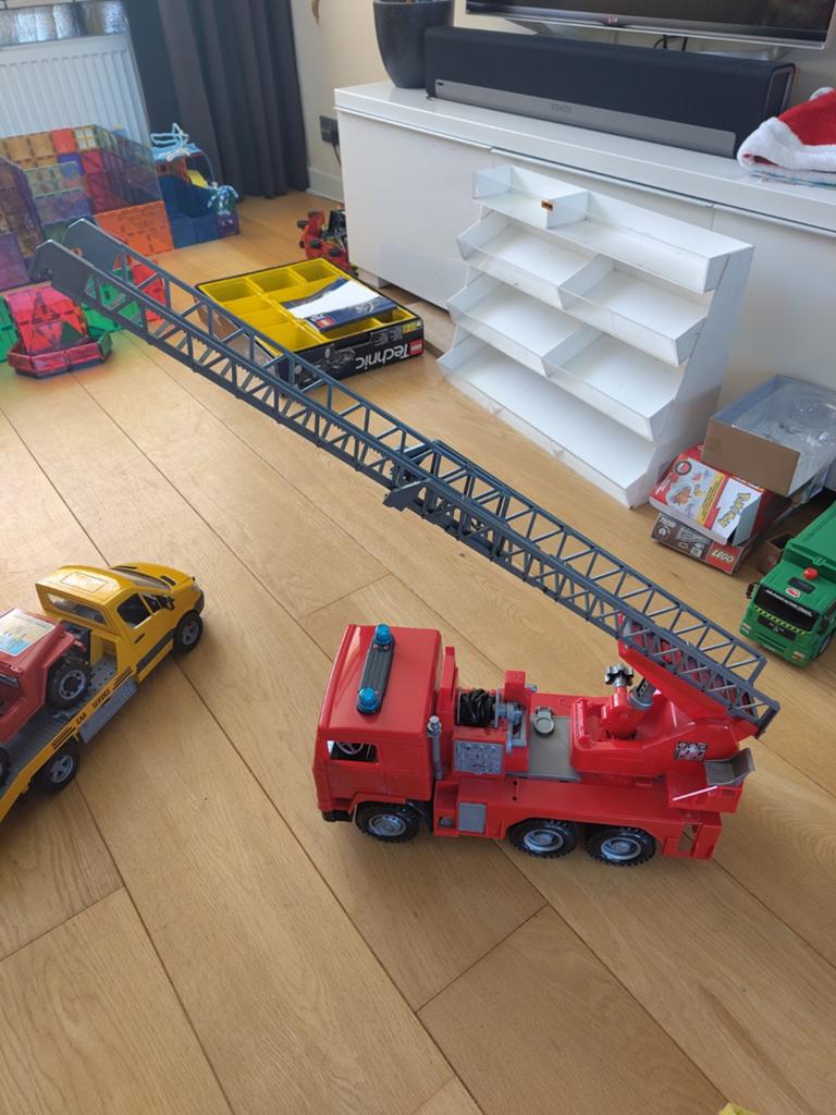 Bruder MAN Brandweerauto, uitschuifbare ladder en waterpomp, Ophalen of Verzenden, Gebruikt