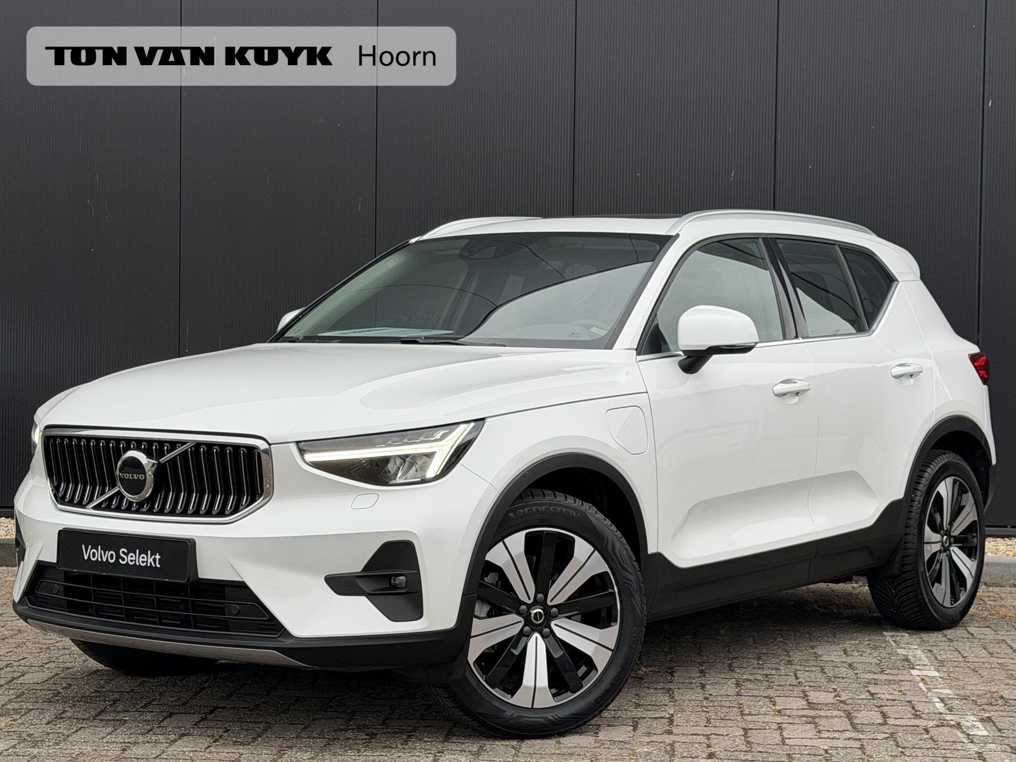 Volvo XC40 1.5 T4 Plug-in hybrid Ultimate Bright Intellisafe, Auto's, Verwarmde buitenspiegels, 1712 kg, Met garantie (alle), Leder en Stof
