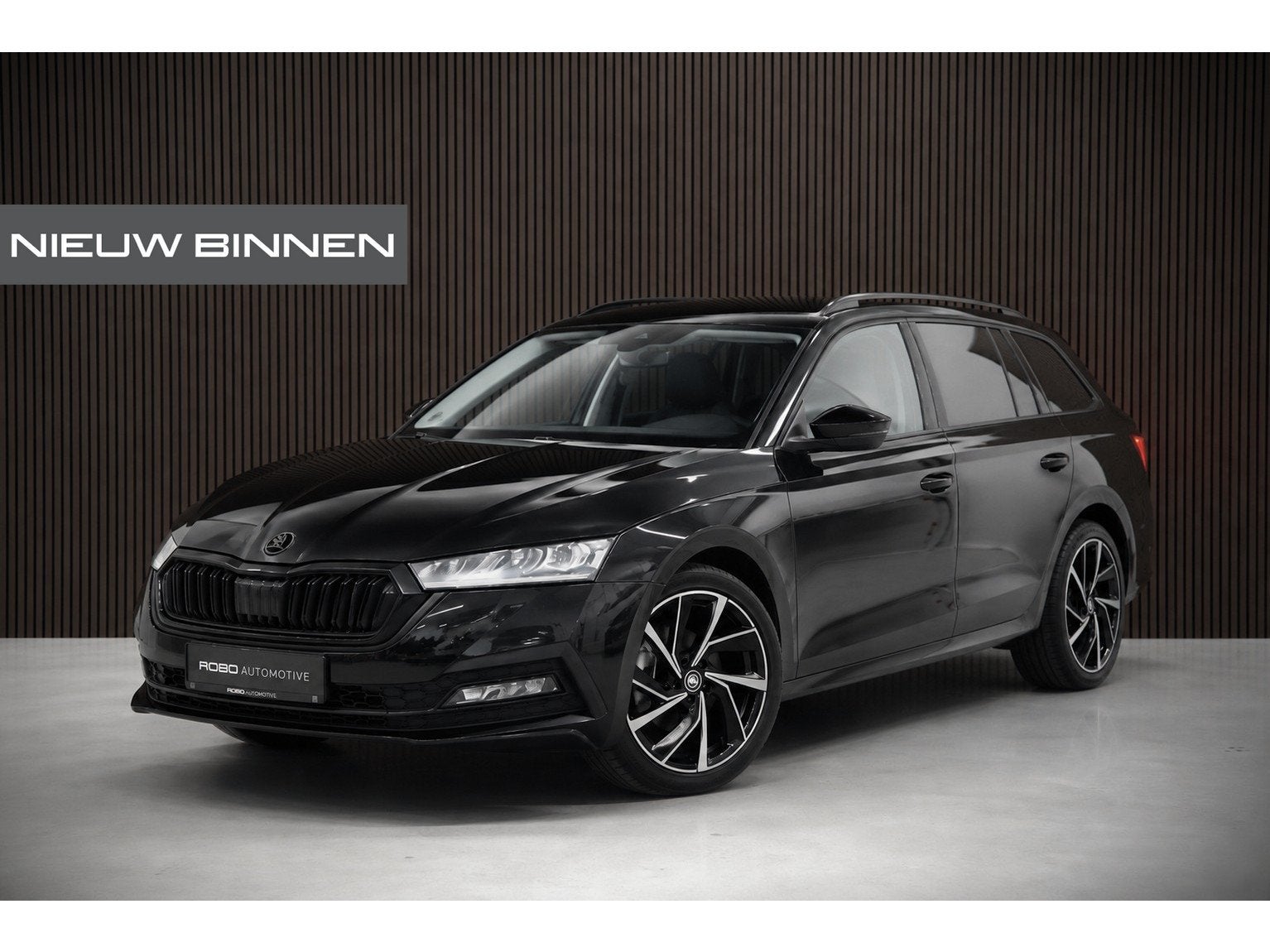 Skoda Octavia Combi 1.4 TSI iV PHEV Ambition | Stuurverwarmi, Auto's, Dealer onderhouden, Stof, Gebruikt, Zwart
