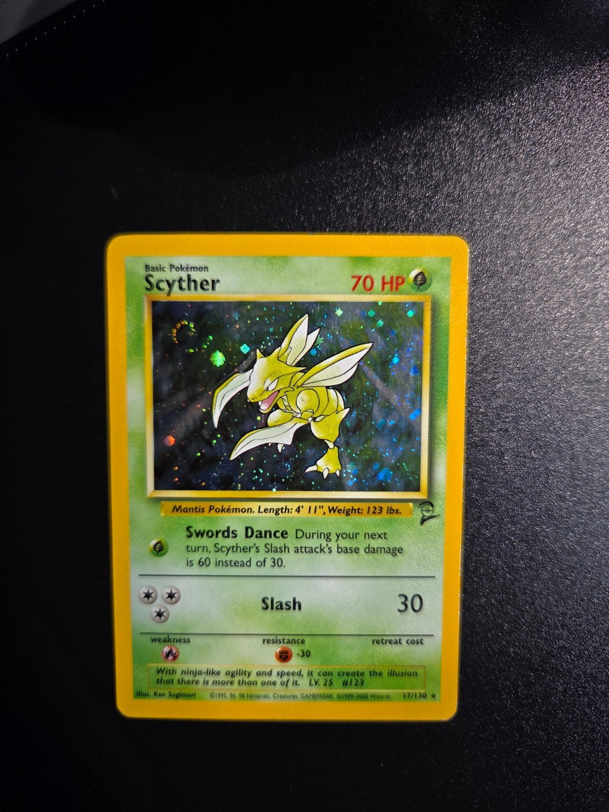 Scyther 17/130 Pokemon Base 2 holo swirl, Ophalen of Verzenden, Zo goed als nieuw, Booster, Foil