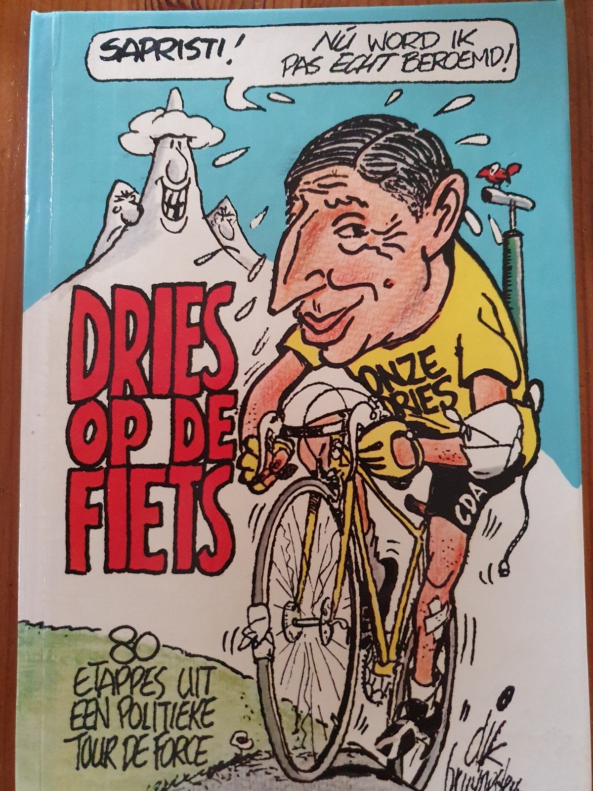 Dries op de fiets, Boeken, Dik bruynesteyn, Ophalen of Verzenden, Zo goed als nieuw, Politiek en Staatkunde