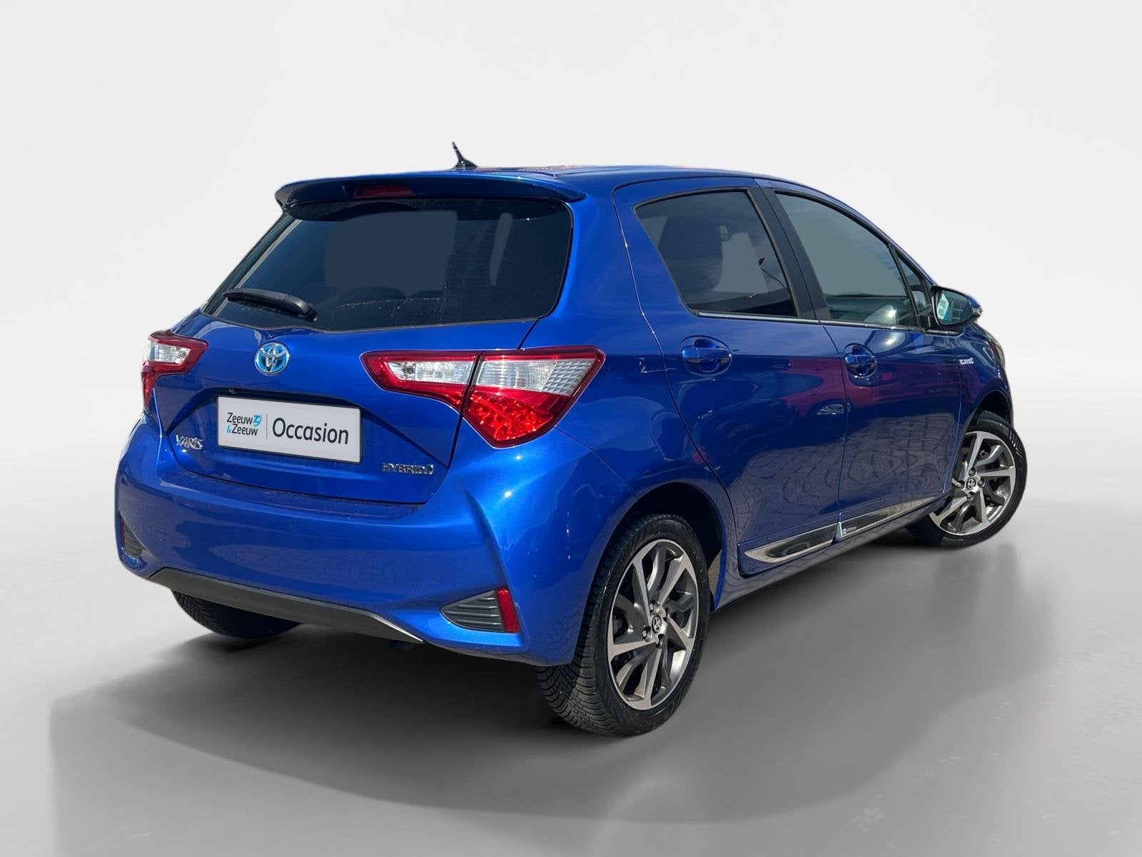 Toyota Yaris 1.5 Hybrid Bi-Tone |Automaat|climate controle|, Auto's, 12 maanden, Gebruikt, 4 cilinders, Blauw