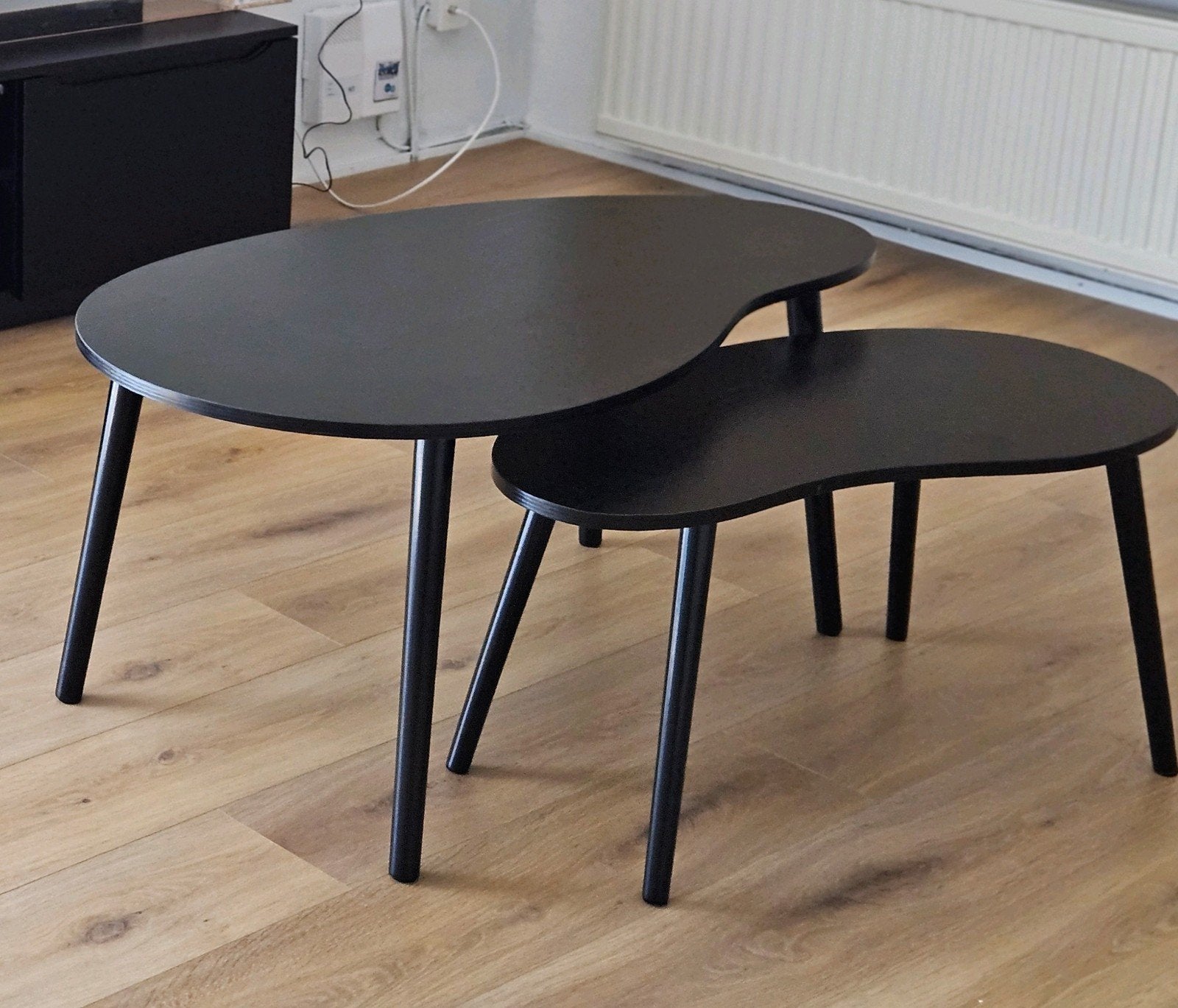 Set van 2 zwarte niervormige salontafels, Ophalen, 100 tot 150 cm, 50 tot 100 cm, Zo goed als nieuw