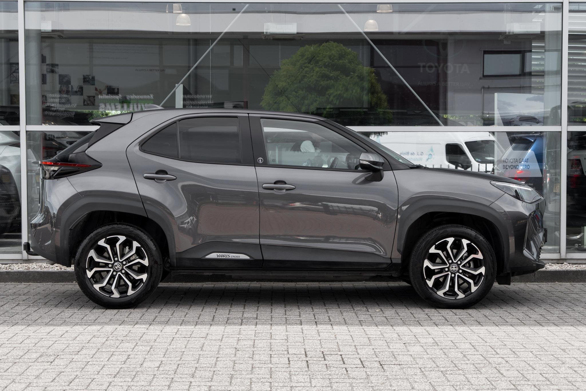 Toyota Yaris Cross 1.5 Hybrid Dynamic, Auto's, Stof, Gebruikt, 116 pk, 49 €/maand